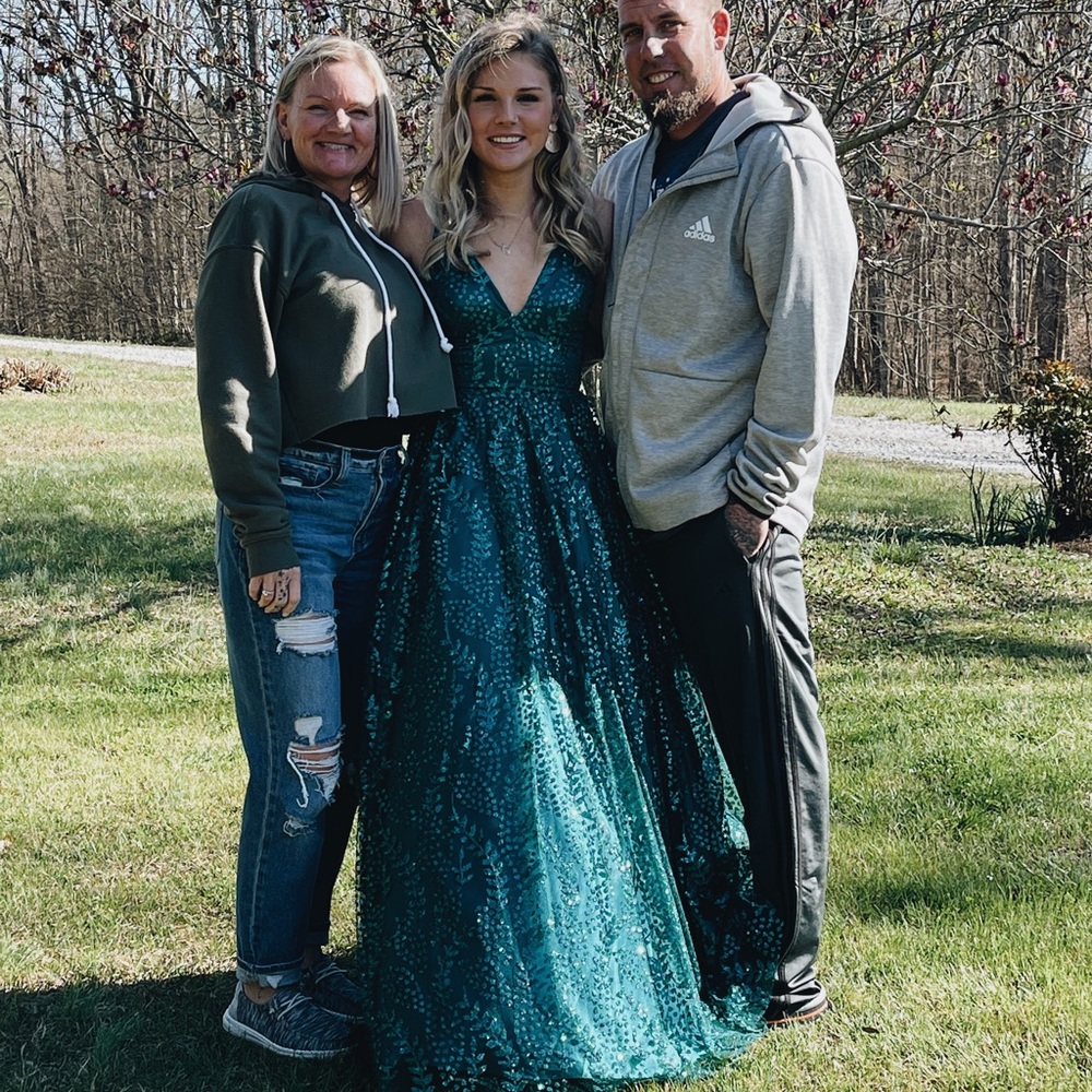 Emerald green Blondie Nites sparkling, v-neck and low back prom dress